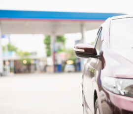 Car parking in gas fuel station - car energy transportation concept